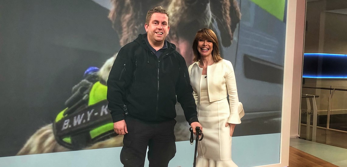 Scamp pictured with SKY presenter Kay Burley and handler Stu Phillips
